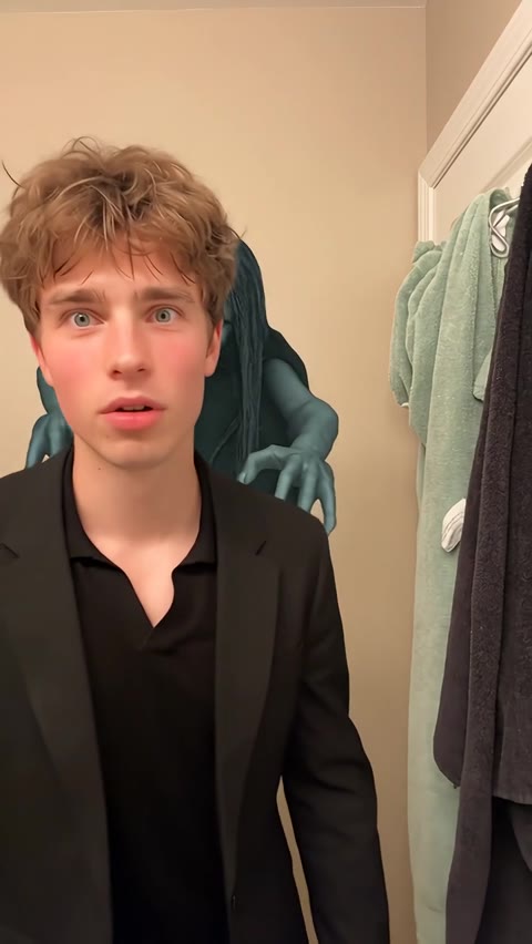 Ghost Filter Prank opening with the man facing forward and the ghost behind his shoulder