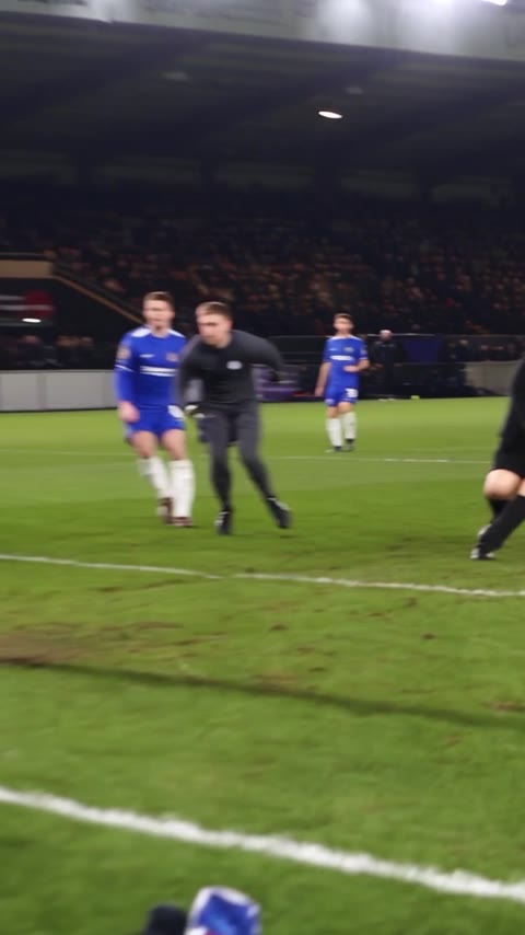 Ozil Goal AI final field view with blue-shirted opponents and a distant goal