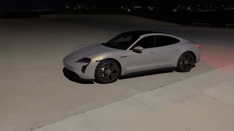 Unforgettable Car AI closing shot of a silver sports car in the parking lot