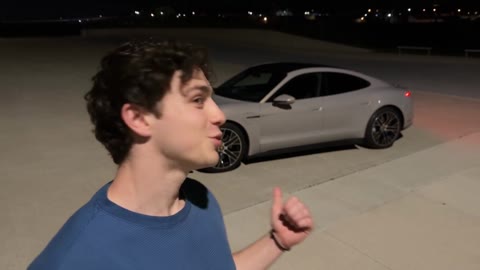 Unforgettable Car AI man looking upward with a silver car appearing behind him